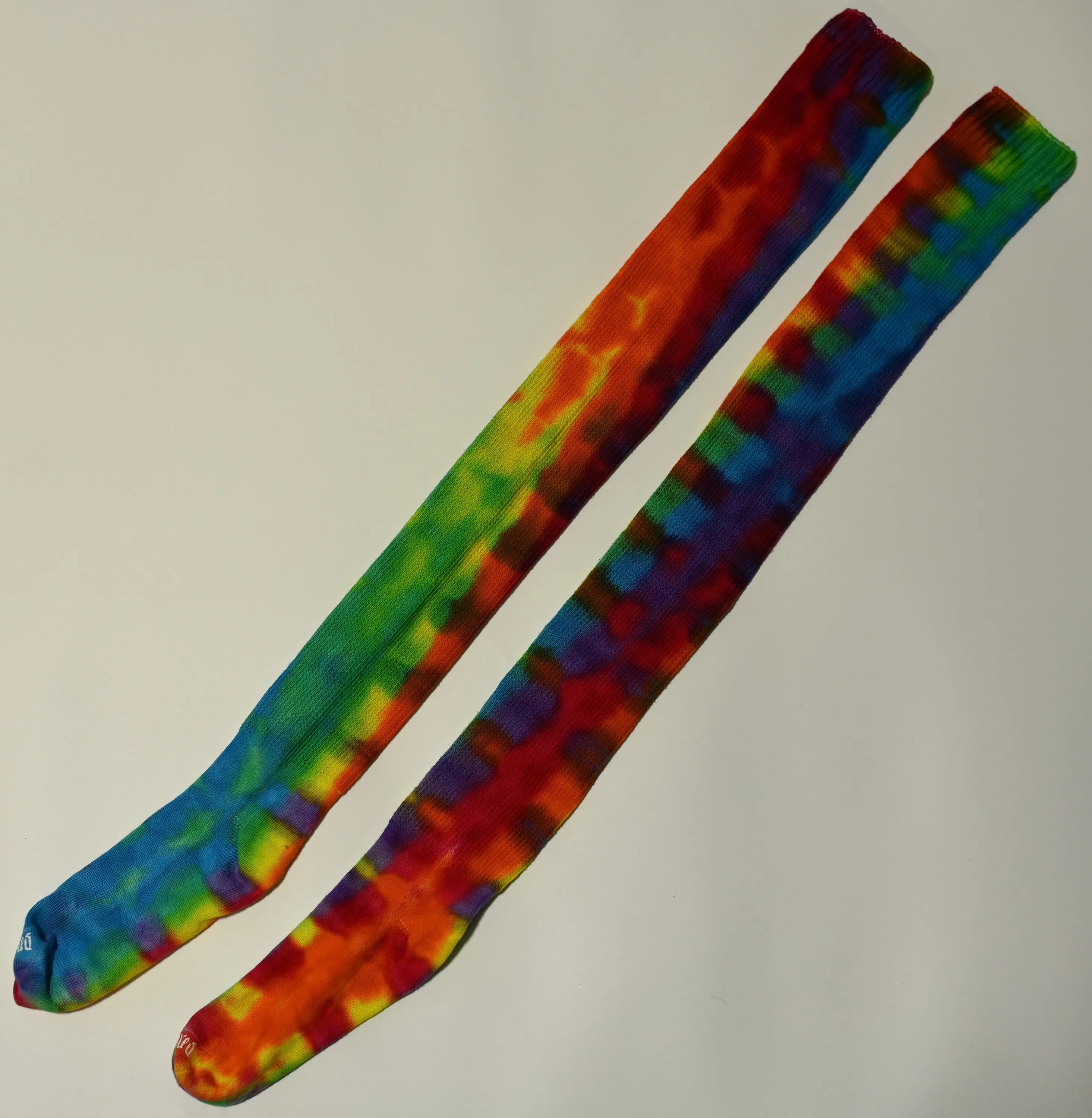 Colorful Trippy Weaver Tie Dye on a Pair of Dharma Trading Company Cotton Blend (89% Cotton/9 Nylon/2 Spandex) Thigh High Socks